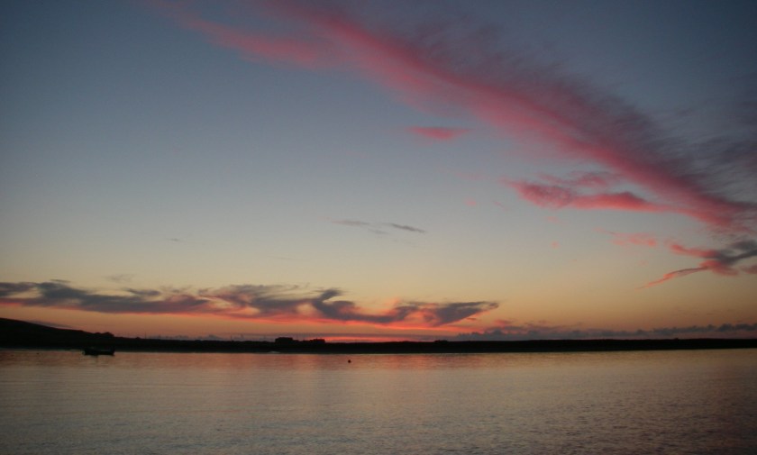 The sun sets over Blacksod Bay.