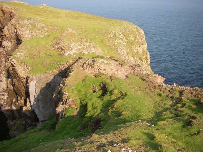 The narrow neck of land between high cliffs which led to the final refuge of the fort and then on to...  