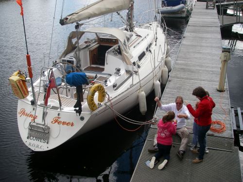 Sorting out a fishing line on a pontoon near Inverness